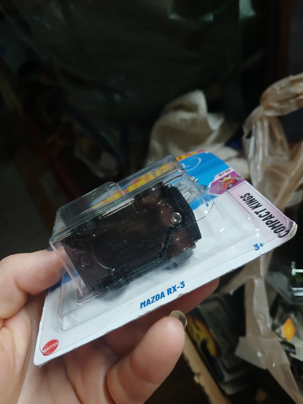 Hot Wheels Tooned Mazda RX-3 in black, featuring the 